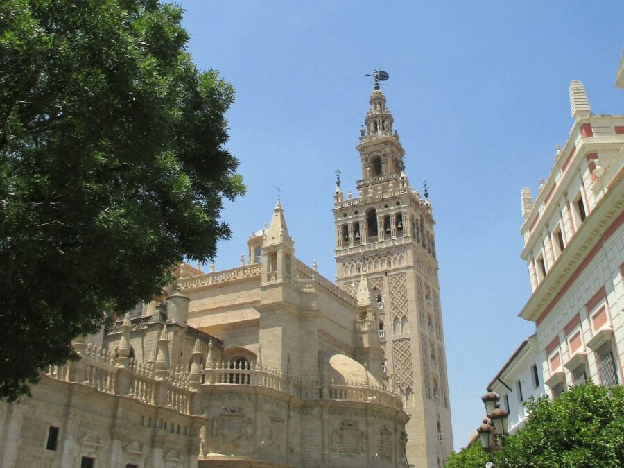 The giralda tower stands tall under a clear sky